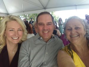 Paige and Chuck Robbins, CEO of Cisco, with Joanne