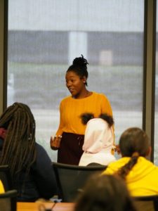 Amber speaks to a group of young women about their careers.