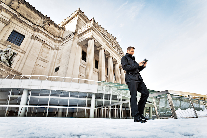 man in front of government building