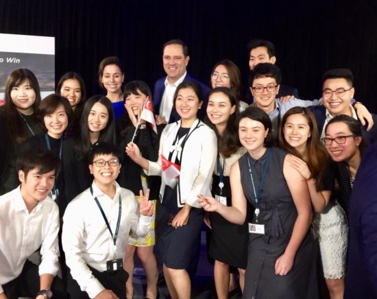 Cisco Interns pose with our CEO Chuck Robbins during an event.