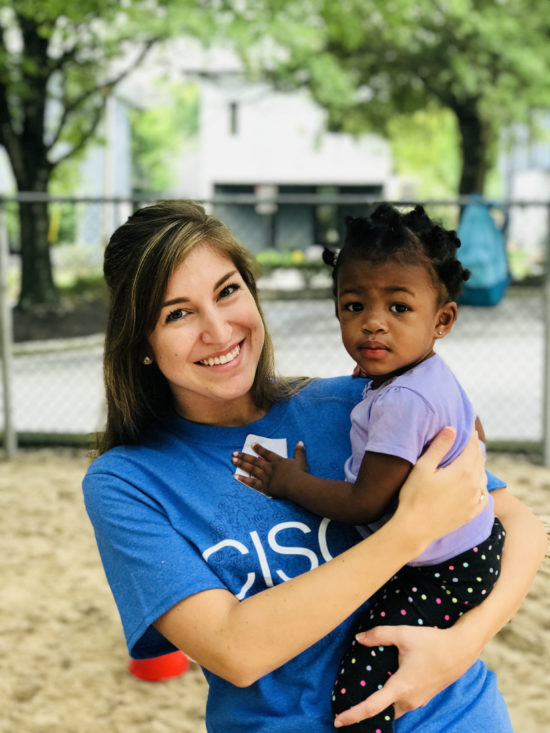 Tracy and a student at Learning Together.