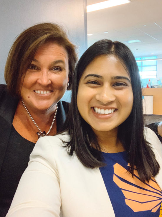 Alisha smiles with Cisco CFO Kelly Kramer