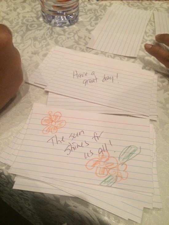 Volunteers wrote cheerful notes to give the homeless in HomeFirst's snack bags