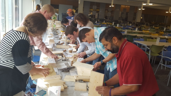 Cisco Volunteers building birdhouses for new home-owners of Habitat Humanity 