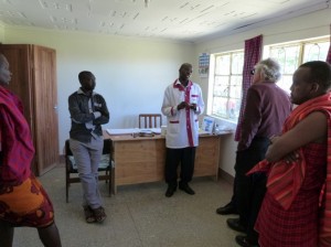 In-charge Samuel N. Kamicha briefs Howard in his office, where Cisco Health Presence will be installed by the end of 2013. (L to R: James Ole Lesaloi, Musa Langat of the Sekenani Community Knowledge Center, Samuel Kamicha, Howard Charney, Geoffrey Tira)