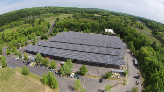 Free standing solar PV array in the parking area of Cisco's campus in Boxborough, MA