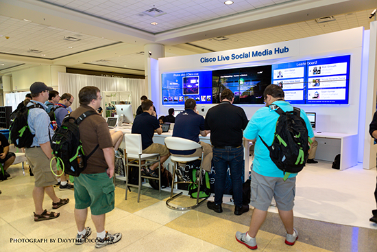 Attendees gather to watch a keynote address at the Social Media Hub.