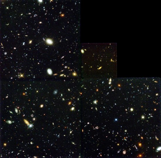 An image from the Hubble Deep Field, which provides a narrow glimpse into of the known universe as it existed billions of years ago. [SOURCE: Wikipedia]