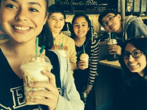 Cisco volunteer Ilene Rafii (far right) treats her young inventors to a latte after weeks of hard work.