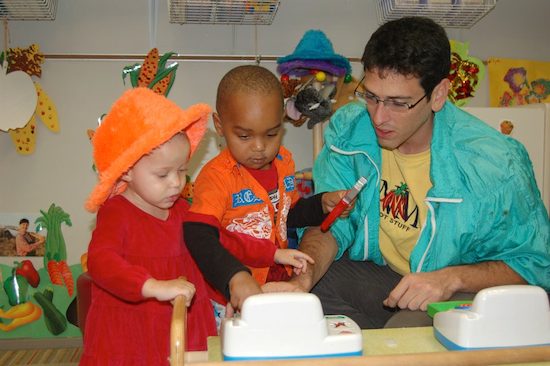 Wesley King volunteering with children at Learning Together, a nonprofit that meets the developmental, educational, and health needs of young children of all abilities.