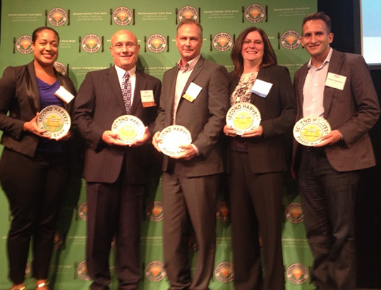 Cisco received 4 "Making Hunger History" awards from the Second Harvest Food Bank on September 10. On hand to receive them were (l-r): Jessica Graham,  community relations manager; Randy Pond, senior vice president of operations; Curt Hill, VP of technical support; Rebecca Jacoby, chief information officer and a Second Harvest board member; and Ricardo Benavidez, senior community relations manager.