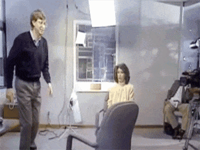 Bill Gates jumping over chair GIF