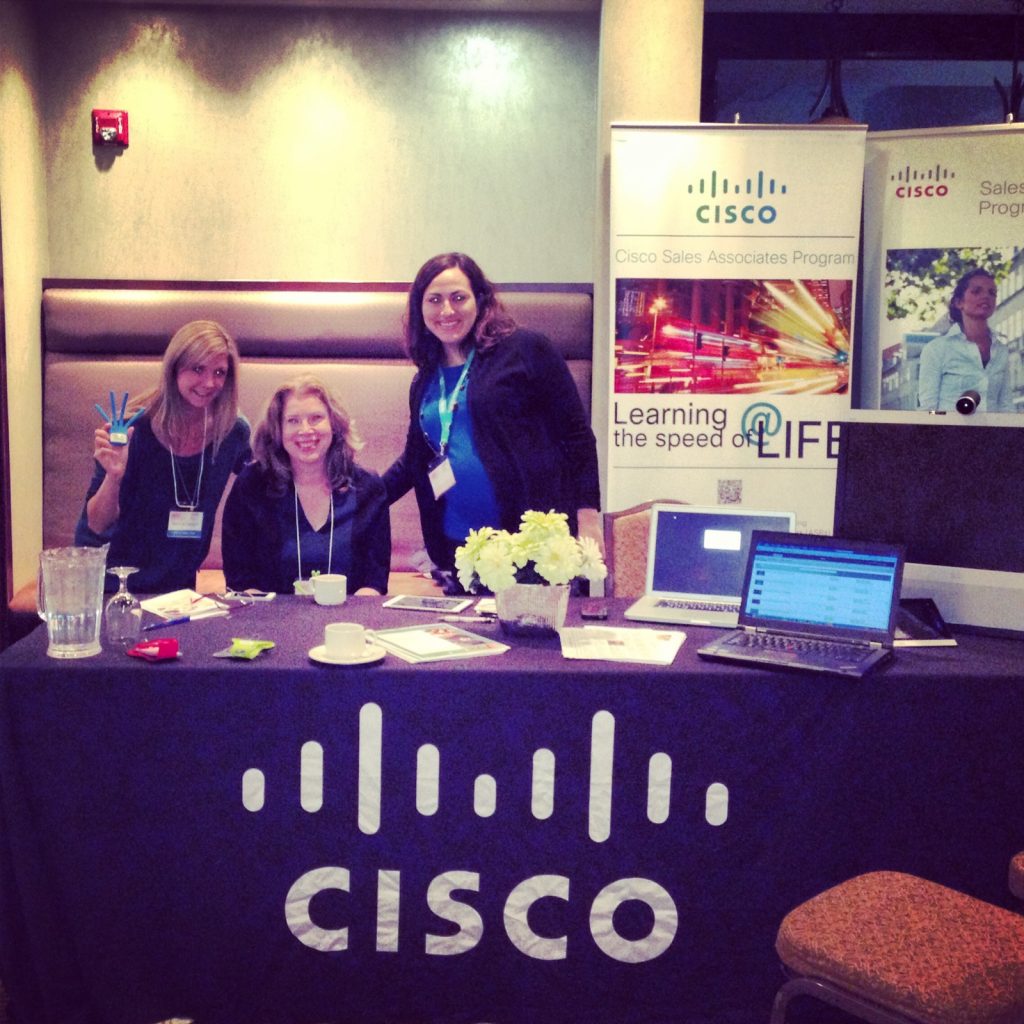 This Cisco Booth is ready! Do we look awake? It is 7:30 AM on Sunday.