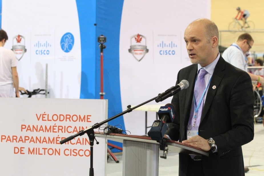 Cisco Canada’s VP of marketing, Mark Collins, speaks with attendees during the Cisco Milton Pan Am/Parapan Am Velodrome opening event on January 9, 2015