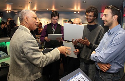 Charles F. Borden meets with the 2014 winners of the NASA Space Apps Toronto Challenge during his visit to the Ontario Science Centre.